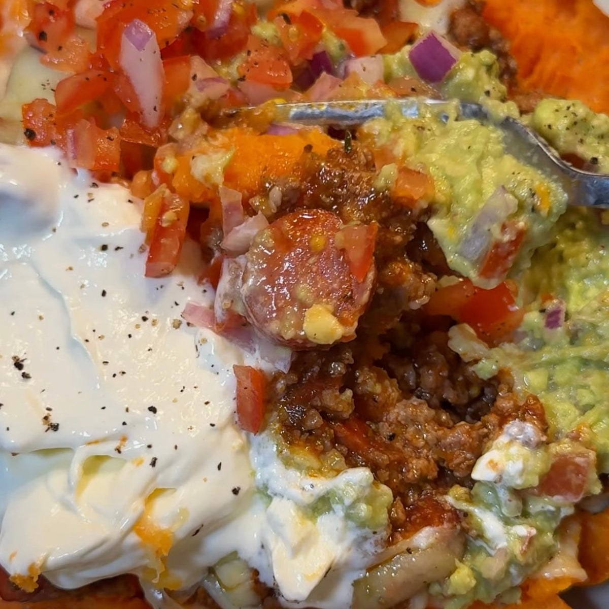 Cheesy Sausage Bolognese Loaded Sweet Potato